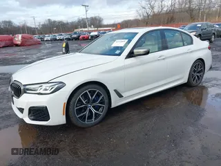 2021 BMW 5 Series M550i xDrive z VIN WBA13BK09MCF05866, wystawiony jako IAAI lot #41574859 z przebiegiem 37 822 mil mil oraz . Historia ofert i sprzedaży dostępna na DreamBid. Obrazek 2.