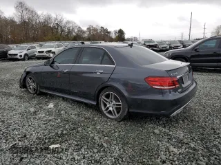 2014 Mercedes-Benz E 550 Sport with VIN WDDHF9BB0EA977408, listed as a Copart auction lot 81741644 with 156,607 mi miles and Salvage Title. Bid and sale history available at DreamBid. Image 2.