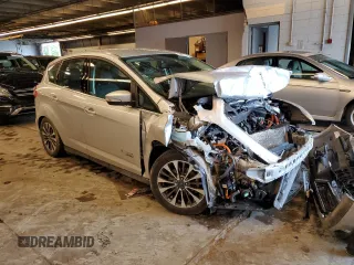 2017 Ford C-Max Energi Titanium with VIN 1FADP5FU7HL102237, listed as a Copart auction lot 57036184 with 68,070 mi miles and Salvage Title. Bid and sale history available at carsss.com. Image 4.