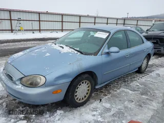 1997 Mercury Sable GS z VIN 1MELM50U3VG655266, wystawiony jako IAAI lot #41612223 z przebiegiem 86 993 mil mil oraz . Historia ofert i sprzedaży dostępna na DreamBid. Obrazek 2.