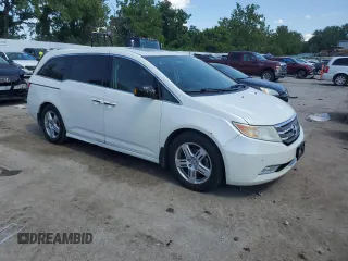 2013 Honda Odyssey Touring with VIN 5FNRL5H99DB052538, listed as a Copart auction lot 66310875 with 192,052 mi miles and Clean title. Bid and sale history available at DreamBid. Image 4.