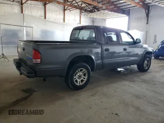 2004 Dodge Dakota Sport z VIN 1D7HL38N54S536938, wystawiony jako Copart lot #52455345 z przebiegiem 157 791 mil mil oraz Szkody całkowita. Historia ofert i sprzedaży dostępna na DreamBid. Obrazek 3.