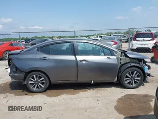 2021 Nissan Versa SV with VIN 3N1CN8EV1ML840835, listed as a IAAI auction lot 42128883 with 77,204 mi miles and . Bid and sale history available at DreamBid. Image 14.