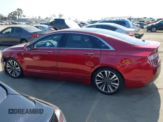 2019 Lincoln MKZ Hybrid Reserve II with VIN 3LN6L5MU7KR617325, listed as a IAAI auction lot 42584481 with 76,118 mi miles and . Bid and sale history available at DreamBid. Image 14.