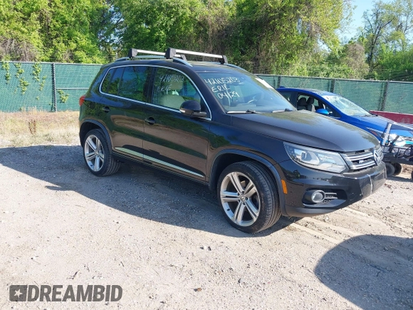 2014 Volkswagen Tiguan S z VIN WVGBV3AX5EW560393, wystawiony jako IAAI lot #42105203 z przebiegiem 102 001 mil mil oraz . Historia ofert i sprzedaży dostępna na DreamBid. Obrazek 1.