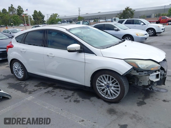 2014 Ford Focus Titanium with VIN 1FADP3N24EL186050, listed as a IAAI auction lot 42481684 with 187,687 mi miles and . Bid and sale history available at DreamBid. Image 1.