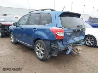 2015 Subaru Forester 2.5i Touring with VIN JF2SJAUC6FH440333, listed as a IAAI auction lot 41414701 with 115,223 mi miles. Bid and sale history available at carsss.com. Image 3.