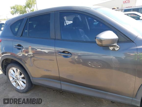 2014 Mazda CX-5 Grand Touring with VIN JM3KE2DY8E0383206, listed as a IAAI auction lot 40205756 with 120,231 mi miles. Bid and sale history available at carsss.com. Image 13.