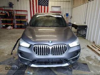 2021 BMW X1 sDrive28i z VIN WBXJG7C04M5S68209, wystawiony jako Copart lot #52099115 z przebiegiem 57 497 mil mil oraz Szkody całkowita. Historia ofert i sprzedaży dostępna na DreamBid. Obrazek 5.