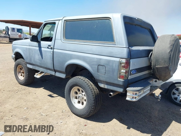 1995 Ford Bronco Custom with VIN 1FMEU15H5SLB65909, listed as a IAAI auction lot 41880810 with 216,927 mi miles. Bid and sale history available at carsss.com. Image 3.