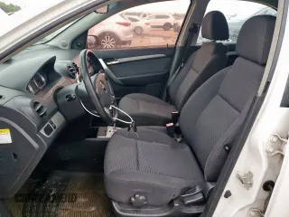 2009 Chevrolet Aveo 1LT z VIN KL1TD56E89B662824, wystawiony jako Copart lot #58526185 z przebiegiem 133 214 mil mil oraz Czysty tytuł • Clean title. Historia ofert i sprzedaży dostępna na DreamBid. Obrazek 7.