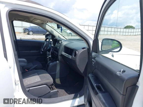 2016 Jeep Compass Sport with VIN 1C4NJCBA0GD742797, listed as a IAAI auction lot 42177186 with 128,665 mi miles and . Bid and sale history available at DreamBid. Image 5.