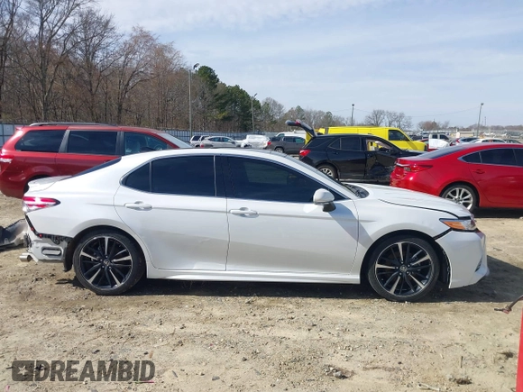 2020 Toyota Camry XSE with VIN 4T1K61AK8LU987937, listed as a IAAI auction lot 41604530 with 102,967 mi miles and . Bid and sale history available at DreamBid. Image 14.