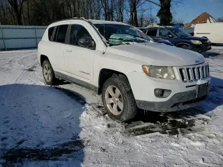 2011 Jeep Compass Latitude with VIN 1J4NF1FB8BD277150, listed as a Copart auction lot 41513635 with 105,434 mi miles and Salvage Title. Bid and sale history available at carsss.com. Image 12.