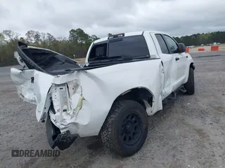 2009 Toyota Tundra 4WD Truck with VIN 5TFBW54119X085037, listed as a IAAI auction lot 41914195 with 211,913 mi miles. Bid and sale history available at carsss.com. Image 4.
