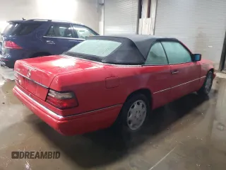 1994 Mercedes-Benz E 320 with VIN WDBEA66E8RC044069, listed as a Copart auction lot 87713565 with 69,061 mi miles and Salvage Title. Bid and sale history available at DreamBid. Image 3.