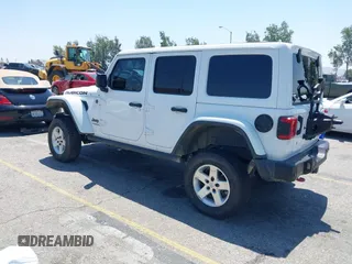 2018 Jeep Wrangler Unlimited Rubicon with VIN 1C4HJXFN8JW215023, listed as a IAAI auction lot 42227099 with 62,195 mi miles and . Bid and sale history available at DreamBid. Image 3.