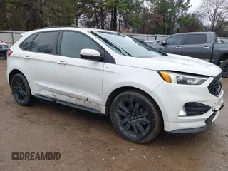 2020 Ford Edge SEL z VIN 2FMPK3J95LBB25307, wystawiony jako IAAI lot #41514580 z przebiegiem 61 916 mil mil oraz . Historia ofert i sprzedaży dostępna na DreamBid. Obrazek 1.