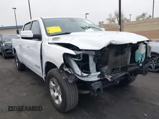 2022 Ram 1500 Big Horn z VIN 1C6RREMT6NN464202, wystawiony jako IAAI lot #42153905 z przebiegiem 34 316 mil mil oraz . Historia ofert i sprzedaży dostępna na DreamBid. Obrazek 1.