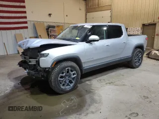 2024 Rivian R1T Adventure z VIN 7FCTGCAA0RN030370, wystawiony jako Copart lot #87251784 z przebiegiem 11 549 mil mil oraz Szkody całkowita. Historia ofert i sprzedaży dostępna na DreamBid. Obrazek 1.