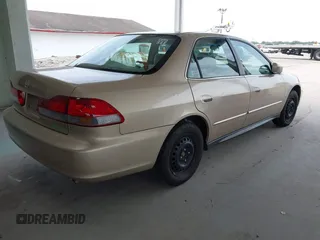2002 Honda Accord LX z VIN 1HGCG56452A135666, wystawiony jako IAAI lot #42436949 z przebiegiem 103 652 mil mil oraz . Historia ofert i sprzedaży dostępna na DreamBid. Obrazek 4.