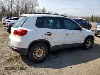 2013 Volkswagen Tiguan with VIN WVGHV7AX5DW527541, listed as a Copart auction lot 52641605 with 317,783 mi miles and Clean Title. Bid and sale history available at DreamBid. Image 3.