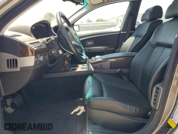 2006 BMW 7 Series 750i with VIN WBAHL83546DT02261, listed as a Copart auction lot 61686475 with 86,909 mi miles and Salvage title. Bid and sale history available at DreamBid. Image 7.
