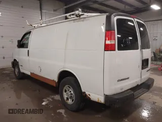 2004 Chevrolet Express Cargo Van with VIN 1GCGG25U641135906, listed as a IAAI auction lot 42038768 with 129,677 mi miles. Bid and sale history available at carsss.com. Image 3.