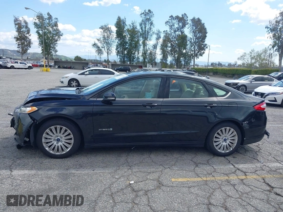 2015 Ford Fusion SE Hybrid with VIN 3FA6P0LU7FR199065, listed as a IAAI auction lot 41944181 with 197,020 mi miles. Bid and sale history available at carsss.com. Image 14.