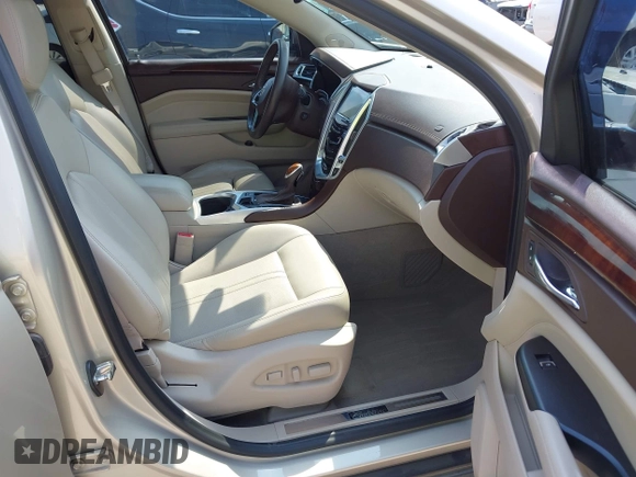 2015 Cadillac SRX Premium Collection with VIN 3GYFNDE38FS561936, listed as a IAAI auction lot 42266801 with 64,820 mi miles and . Bid and sale history available at DreamBid. Image 5.