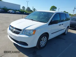 2015 Dodge Grand Caravan SE with VIN 2C4RDGBGXFR569435, listed as a IAAI auction lot 42057084 with 160,058 mi miles and . Bid and sale history available at DreamBid. Image 2.