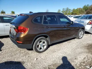 2015 BMW X1 sDrive28i with VIN WBAVM1C54FV316825, listed as a Copart auction lot 83592644 with 76,823 mi miles and Salvage Title. Bid and sale history available at carsss.com. Image 3.