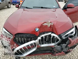 2021 BMW X6 sDrive40i z VIN 5UXCY4C01M9G08122, wystawiony jako Copart lot #44947865 z przebiegiem 90 011 mil mil oraz Szkody całkowita. Historia ofert i sprzedaży dostępna na DreamBid. Obrazek 14.