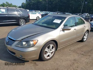 2006 Acura RL z VIN JH4KB16596C005876, wystawiony jako IAAI lot #42666228 z przebiegiem 146 897 mil mil oraz . Historia ofert i sprzedaży dostępna na DreamBid. Obrazek 2.
