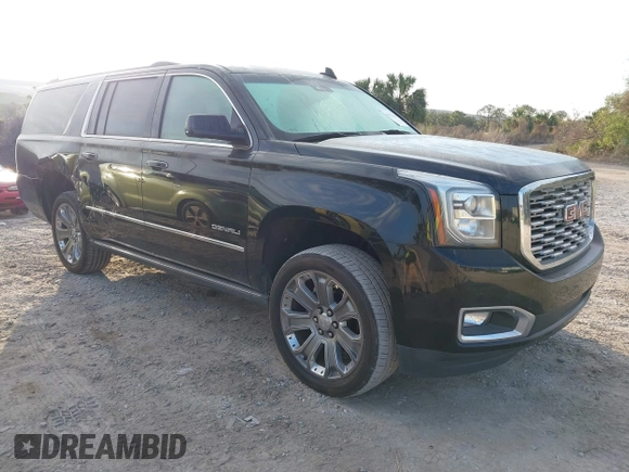 2019 GMC Yukon XL Denali with VIN 1GKS2HKJ2KR226275, listed as a IAAI auction lot 41552828 with 82,069 mi miles. Bid and sale history available at carsss.com. Image 1.