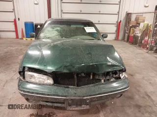 1997 Pontiac Bonneville SE z VIN 1G2HX52KXVH250272, wystawiony jako IAAI lot #41644041 z przebiegiem 160 791 mil mil oraz . Historia ofert i sprzedaży dostępna na DreamBid. Obrazek 6.