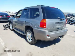 2008 GMC Envoy Denali with VIN 1GKET63M082201867, listed as a IAAI auction lot 41874803 with 218,639 mi miles. Bid and sale history available at carsss.com. Image 3.