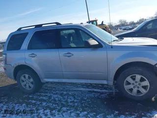 2010 Mercury Mariner with VIN 4M2CN8B72AKJ30465, listed as a IAAI auction lot 41554592 with 110,973 mi miles. Bid and sale history available at carsss.com. Image 14.