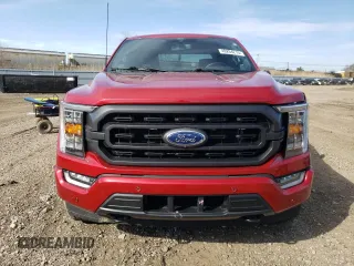 2022 Ford F-150 XL with VIN 1FTEW1EP3NFA79541, listed as a Copart auction lot 49204215 with 54,992 mi miles and Salvage Title. Bid and sale history available at DreamBid. Image 5.