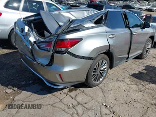 2020 Lexus RX with VIN JTJJGKFA7L2013877, listed as a IAAI auction lot 40678497 with 67,271 mi miles. Bid and sale history available at carsss.com. Image 4.