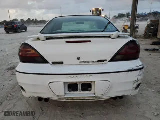 2004 Pontiac Grand Am GT with VIN 1G2NW52E34M636201, listed as a Copart auction lot 79112994 with 108,409 mi miles and Salvage Title. Bid and sale history available at carsss.com. Image 6.
