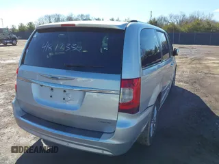 2011 Chrysler Town & Country Limited z VIN 2A4RR6DG1BR609818, wystawiony jako IAAI lot #41817330 z przebiegiem 160 482 mil mil oraz . Historia ofert i sprzedaży dostępna na DreamBid. Obrazek 4.
