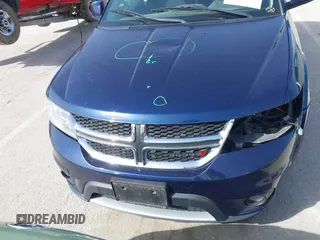 2017 Dodge Journey SXT z VIN 3C4PDDBG6HT697189, wystawiony jako IAAI lot #41717359 z przebiegiem 128 073 mil mil oraz . Historia ofert i sprzedaży dostępna na DreamBid. Obrazek 6.