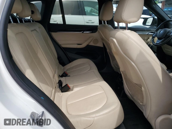 2017 BMW X1 xDrive28i with VIN WBXHT3Z37H4A55614, listed as a Copart auction lot 63491415 with 120,680 mi miles and Salvage title. Bid and sale history available at DreamBid. Image 11.