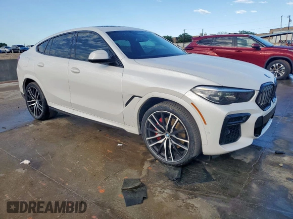 2023 BMW X6 xDrive40i z VIN 5UXCY6C08P9N43749, wystawiony jako Copart lot #54092795 z przebiegiem 39 495 mil mil oraz Szkody całkowita. Historia ofert i sprzedaży dostępna na DreamBid. Obrazek 4.