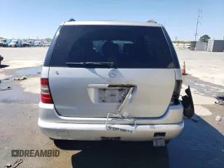 2000 Mercedes-Benz M 320/430/500 with VIN 4JGAB54E7YA151114, listed as a Copart auction lot 50175395 with 166,093 mi miles and Salvage Title. Bid and sale history available at DreamBid. Image 6.