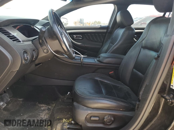 2013 Ford Taurus SEL with VIN 1FAHP2H8XDG229163, listed as a Copart auction lot 71637534 with 120,525 mi miles and Clean Title. Bid and sale history available at DreamBid. Image 7.