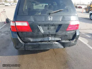 2005 Honda Odyssey EX-L with VIN 5FNRL38745B063371, listed as a IAAI auction lot 41798082 with 222,879 mi miles. Bid and sale history available at carsss.com. Image 6.