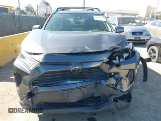 2019 Toyota RAV4 LE with VIN JTMG1RFV3KD025974, listed as a IAAI auction lot 41879264 with 131,933 mi miles and . Bid and sale history available at DreamBid. Image 12.