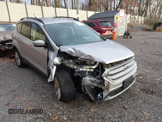 2018 Ford Escape SEL with VIN 1FMCU9HD6JUA58844, listed as a IAAI auction lot 40863795 with 74,907 mi miles. Bid and sale history available at carsss.com. Image 1.